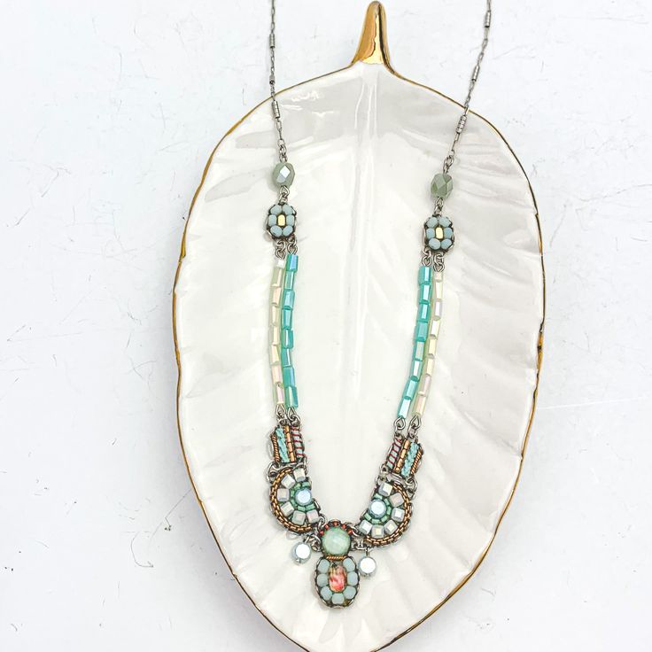 Embrace elegance with our "mint Ice" Ayala Bar pieces, featuring a stunning blend of fabric and metals that exudes bohemian charm. The adjustable length allows for versatility, measuring 16 to 19 inches to complement any neckline with ease. earrings small 1.5” stud style Bohemian Light Blue Jewelry For Festivals, Nickel-free Light Blue Bohemian Jewelry, Bohemian Light Blue Nickel-free Jewelry, Bohemian Light Blue Necklaces For Summer, Stud Style, Ice Blue, Bridal Collection, Ring Bracelet, Ring Earrings