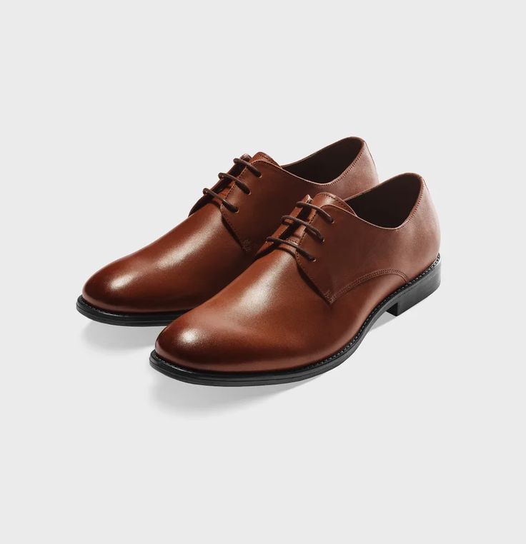 Brown Leather Shoes | The Black Tux Brown Lace-up Shoes With Textured Sole For Derby, Brown Brogue Lace-up Shoes For Office, Brown Textured Sole Oxfords For Business, Brown Plain Toe Lace-up Shoes For Business Casual, Masculine Brown Leather Shoes With Round Toe, Brown Oxford Dress Shoes With Almond Toe, Brown Leather Shoes With Round Toe For Work, Classic Brown Oxford Leather Shoes, Brown Oxford Shoes With Textured Sole