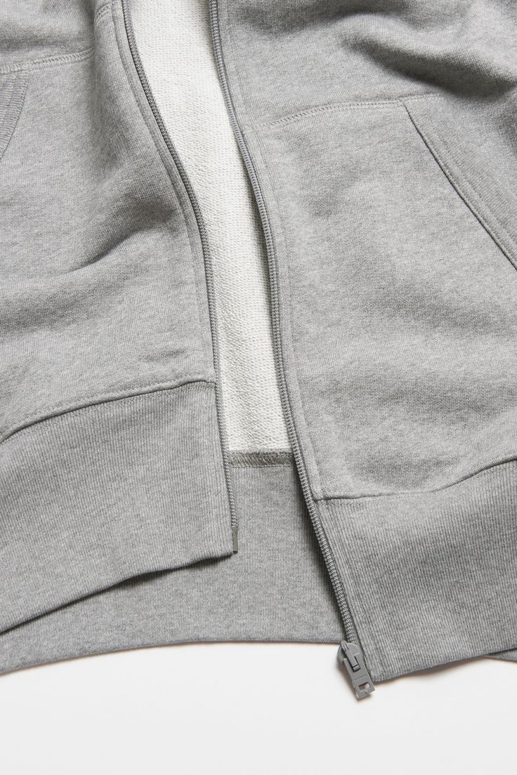 Sweater cardigan is crafted from midweight fleece cotton, detailed with a Face logo patch on the chest. Complete a hood and a kangaroo pocket. Cut to a relaxed unisex fit and hip length. Sporty Cotton Hooded Jacket With Ribbed Cuffs, Everyday Fleece Hooded Jacket With Ribbed Cuffs, Cotton Hooded Jacket With Ribbed Cuffs For Loungewear, Cotton Sweatshirt With Fleece Lining For Loungewear, Cotton Athleisure Hoodie With Pockets, Cotton Hooded Track Jacket With Drawstring, Fleece Track Jacket Hoodie With Pockets, Sporty Cotton Fleece Jacket With Drawstring Hood, Cotton Athleisure Hooded Jacket With Kangaroo Pocket