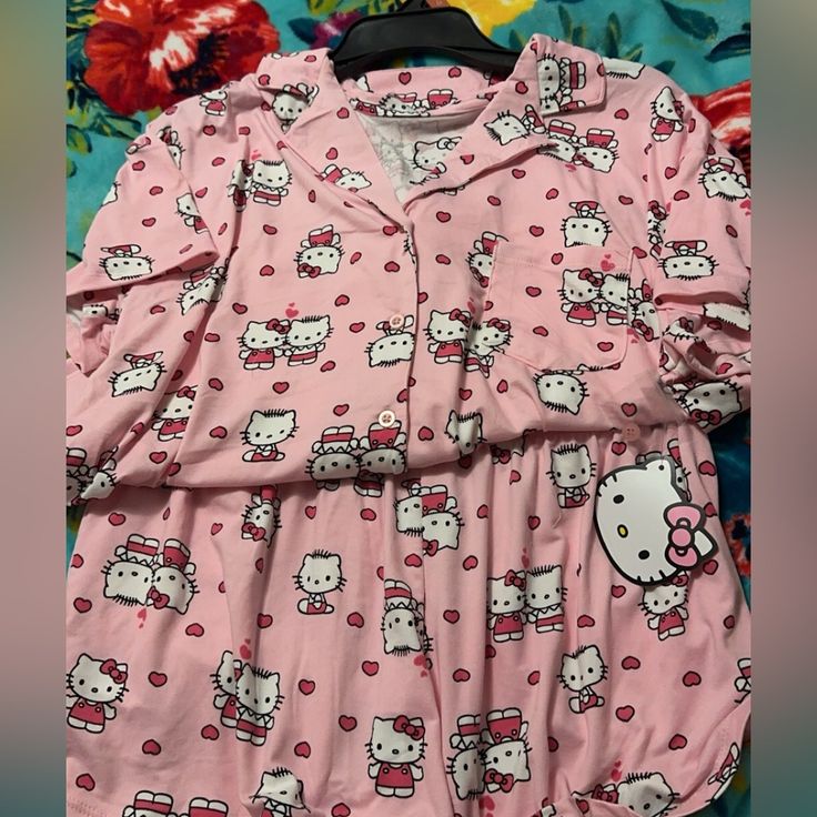 Hello Kitty Dear Daniel Pajamas Available In Small, Medium, Large, And Extra Large! Sanrio Valentine Sleepwear Cute Hello Kitty Tops For Sleepover, Cute Hello Kitty Print Tops For Sleepover, Pink Kawaii Hello Kitty Sleepwear, Playful Hello Kitty Print Sleepwear, Cute Tops For Lounging, Kawaii Hello Kitty Sleepwear For Pajama Party, Hello Kitty Print Cotton Sleepwear, Kawaii Hello Kitty Sleepwear For Loungewear, Kawaii Hello Kitty Print Sleepwear For Loungewear