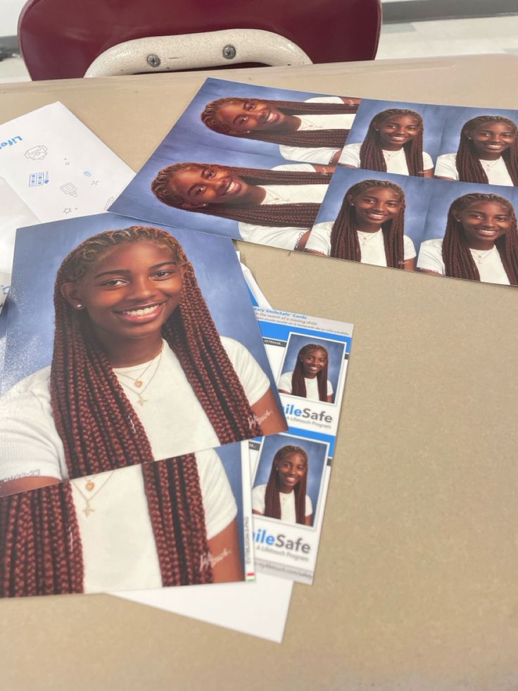 several pictures of women with braids on them sitting on top of a table next to a red chair