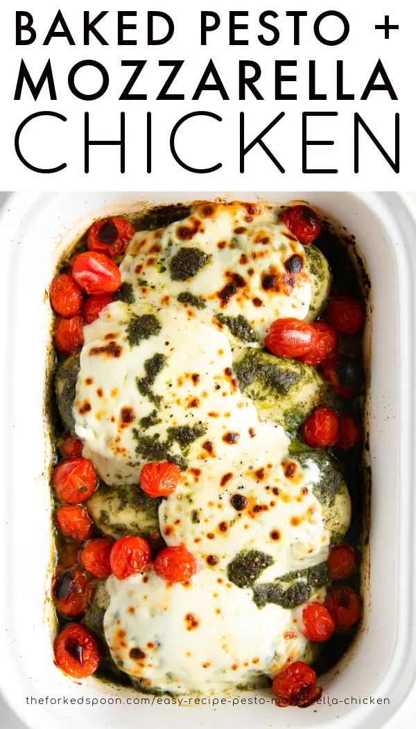 baked pesto and mozzarella chicken in a casserole dish with tomatoes