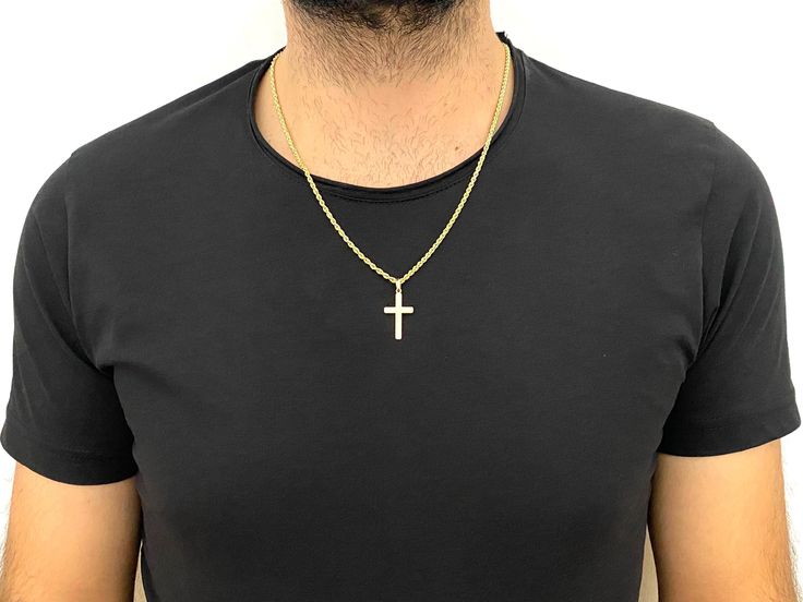 Gold Rope Chain Cross Necklace is a beautiful blend of elegance and spirituality, making it the perfect accessory for both men and women. Whether you're looking for a meaningful Christian Gift, a Men's Necklace, or a Christmas Gift to celebrate faith, this timeless piece is ideal for expressing both style and devotion. The versatile design allows you to choose between Women's Cross and Men's Cross options to find the perfect fit for anyone. This cross necklace is crafted in 925 sterling silver with a 14K Gold Filled finish, ensuring durability and long-lasting beauty. To further personalize your jewelry, you can select from multiple cross models or add a custom engraving to the back of the pendant. Make it uniquely yours or create a truly special gift for your loved ones. Important: Please Chain Cross Necklace, Gold Rope Chains, Mens Crosses, Men's Necklace, Religious Jewelry, Gifts Christmas, Christian Gifts, Rope Chain, Men Necklace