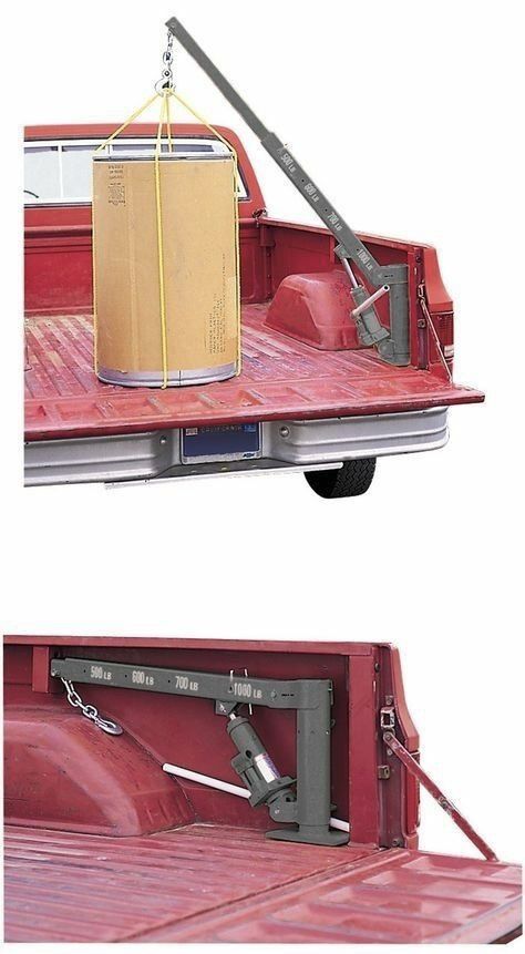 the back end of a red pickup truck with a box on it's bed