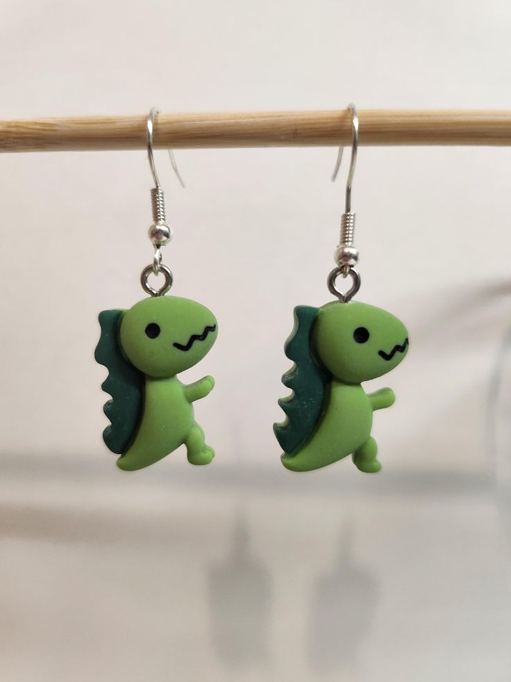 Green t-rex drop earrings, silver hook Green Dinosaur, Drop Earrings Silver, Holiday Deals, T Rex, Earrings Silver, Jewelry Earrings Dangle, Etsy Earrings, United Kingdom, Dangle Drop Earrings