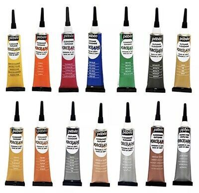 twelve different colors of acrylic paint