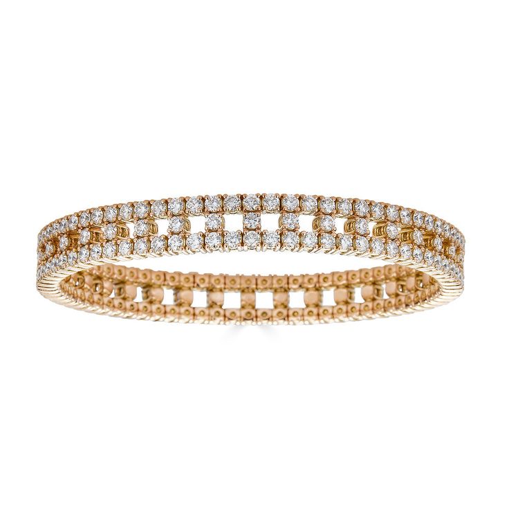 This gorgeous diamond bracelet is part of ZYDO's signature Stretch Collection and boasts a total of 6.82 carats of top quality F color and VS clarity diamonds. The bracelet is mounted on 18k rose gold and holds a double row of continuous round diamonds all around, with several round shape diamonds in between the two rows. Handcrafted in Italy by ZYDO.Gem: White DiamondsQuality: Clarity: VS, Color: FTotal Diamond Carat Weight: 6.82 caratsDimension: Length: 6.75 inches Gold Stretch Bracelet, Italian Jewelry, Classic Chic, Pendant Rings, Ring Collections, Boutique Jewelry, Diamond Carat, High Quality Jewelry, Stretch Bracelet