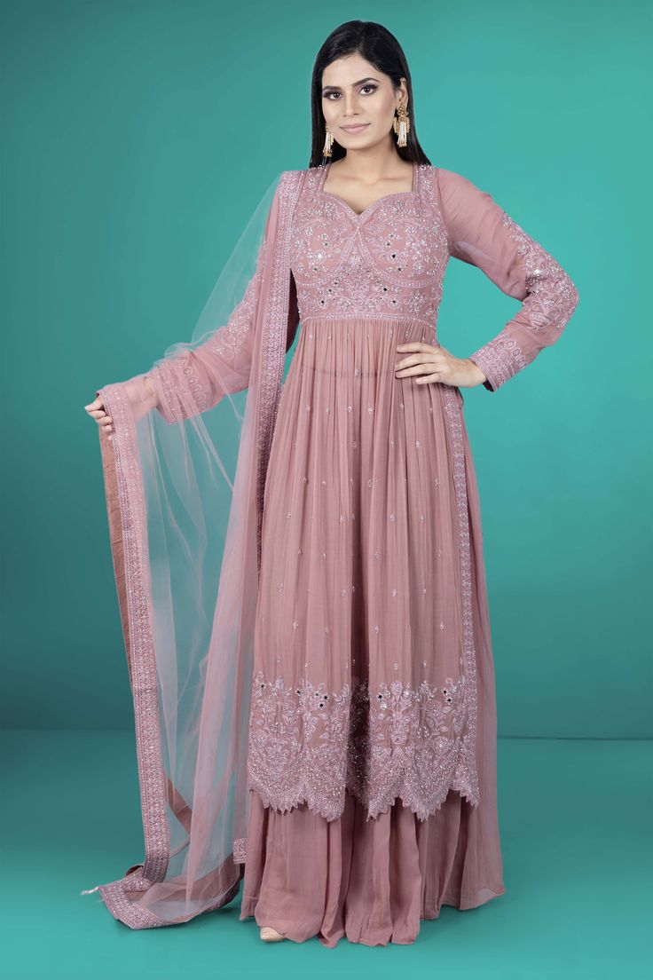 Introducing our elegant Partywear Suit D-116! Featuring a comfortable plazzo and exquisite mirror and thread work, this suit is the perfect choice for any special occasion. Enjoy the blend of traditional and modern designs in this expertly crafted piece. Elevate your style with our Partywear Suit D-116. Pink Palazzo Set With Dori Work For Wedding, Designer Floor-length Salwar Kameez With Dori Work, Elegant Chikankari Embroidery Anarkali Set, Maxi Length, Festive Floor-length Palazzo Set With Dori Work, Anarkali Floor-length Palazzo Set With Dori Work, Unstitched Pink Palazzo Set With Mirror Work, Elegant Pink Palazzo Set With Dori Work, Pink Semi-stitched Maxi Sets, Elegant Resham Embroidered Maxi Anarkali Set