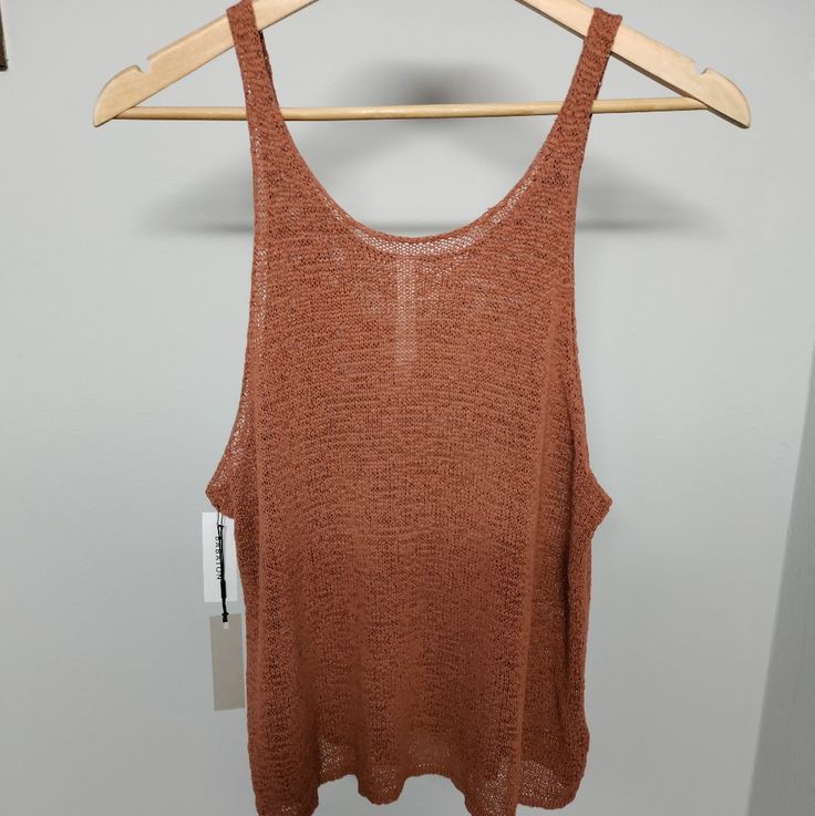 The Babaton Group By Aritzia Msrp $68.00 -Description: The Eugenie Tank Top -Color: "Colorado" (Rust Brown) -Size: Small -Condition: New With Tags Fitted Orange Beach Top, Chic Brown Tank Top For Beach, Brown Tops For Beach Vacation, Brown Tops For Vacation And Beach Season, Fitted Brown Tank Top For The Beach, Fitted Orange Tops For Beach Season, Fitted Brown Summer Tank Top, Fitted Brown Tank Top For Vacation, Chic Orange Tops For Beach Season