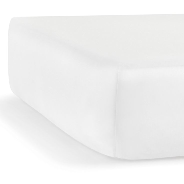 an image of a bed with white sheets