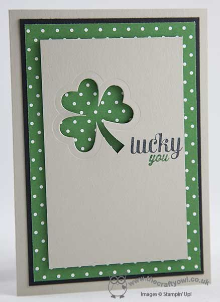 a shamrock card with the words lucky you written in green and white dots on it