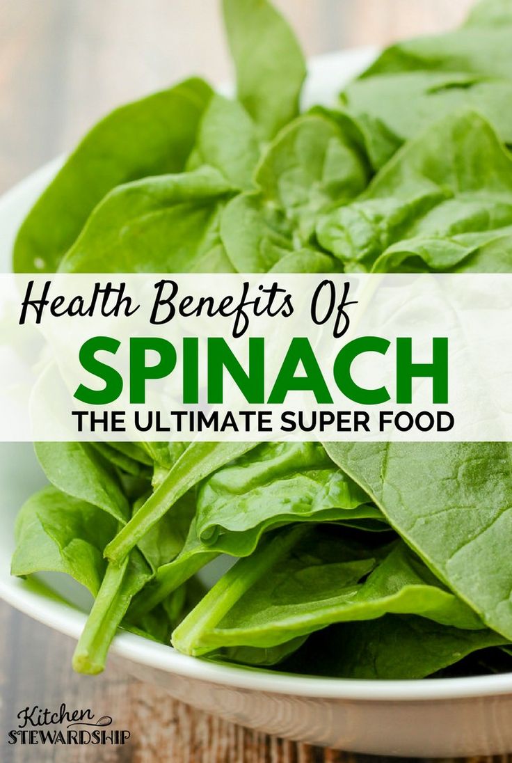 spinach leaves in a bowl with text overlay that reads health benefits of spinach the ultimate super food