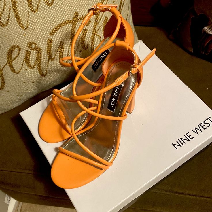 Peachy Orange Criss Cross Block Heel Sandal Never Worn Orange Flat Sandals For Spring, Orange Synthetic Heels For Summer, Trendy Orange Block Heel Sandals, Orange Synthetic Sandals With Wrapped Heel, Orange Sandals With Heel Strap For Spring, Orange Ankle Strap Heels For Spring, Summer Orange Sandals With Wrapped Heel, Orange Strappy Sandals With Heel Strap, Orange Block Heel Sandals For Vacation