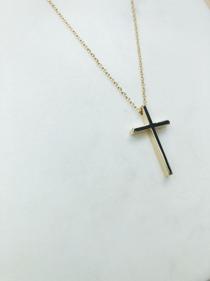 "Gold cross necklace, cross necklace, religious necklace cross, religious gift, simple cross necklace, gold necklace, religious gifts women Simple and elegant shiny gold plated cross necklace. D E T A I L S: * Gold plated cross pendant charm 13mm x 23mm * gold plated chain *Shown at 18\" length SHIPPING: *Free domestic shipping on all orders PACKAGING: *All pieces come beautifully packaged, perfect for gift giving. Find more to ❤️ here: http://etsy.com/shop/thejewelrystandard" Simple Yellow Gold Cross Necklace, Everyday Cross Necklace With Clavicle Chain, Everyday Clavicle Chain Cross Necklace, Minimalist Cross Necklace With Clavicle Chain, Minimalist Crucifix Cross Necklace With Clavicle Chain, Simple Everyday Cross Pendant Necklace, Everyday Minimalist Cross Pendant Necklace, Minimalist Daily Wear Cross Pendant Necklace, Simple Everyday Cross Necklace