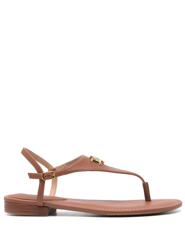 caramel brown calf leather almond open toe thong strap gold-tone logo lettering branded leather insole rubber sole buckle-fastening ankle strap Classic Brown T-strap Sandals With Open Toe, Classic Brown Open Toe T-strap Sandals, Brown Calf Leather Sandals With Single Toe Strap, Classic Open Toe T-strap Sandals With Tang Buckle, Brown T-strap Sandals With Tang Buckle, Classic Brown Calf Leather Sandals, Designer Brown Sandals With Tang Buckle, Classic Brown Toe Post Sandals, Calf Leather Sandals With Gold-tone Hardware