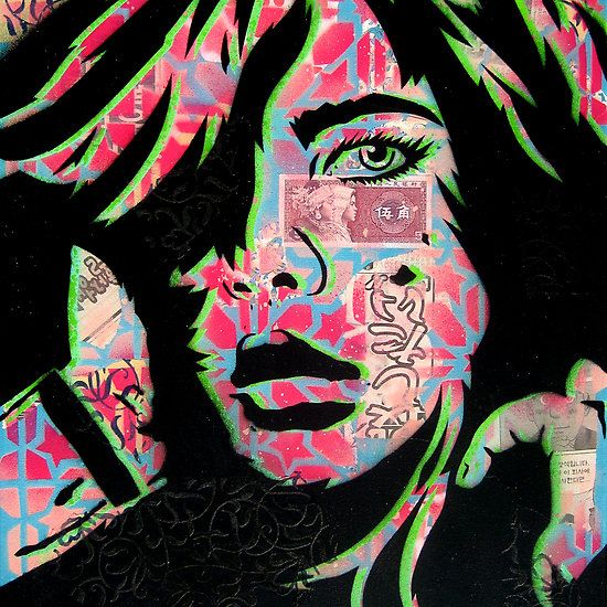 a woman's face is painted on a wall with many different colors and patterns