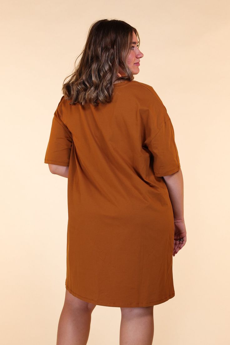 Elevate your everyday fashion with our Rust T-Shirt Dress, a versatile and chic addition to your wardrobe. This dress effortlessly combines comfort and style, making it a must-have piece for any fashion-conscious individual. Fall Relaxed Fit Short Sleeve T-shirt Dress, Casual Solid Color T-shirt Dress For Loungewear, Chic Cotton T-shirt Dress, Trendy Relaxed Fit Cotton T-shirt Dress, Spring Everyday Relaxed Fit T-shirt Dress, Relaxed Fit Crew Neck Everyday Dress, Oversized Casual T-shirt Dress For Daywear, Casual Oversized T-shirt Dress For Daywear, Oversized T-shirt Dress For Spring Loungewear