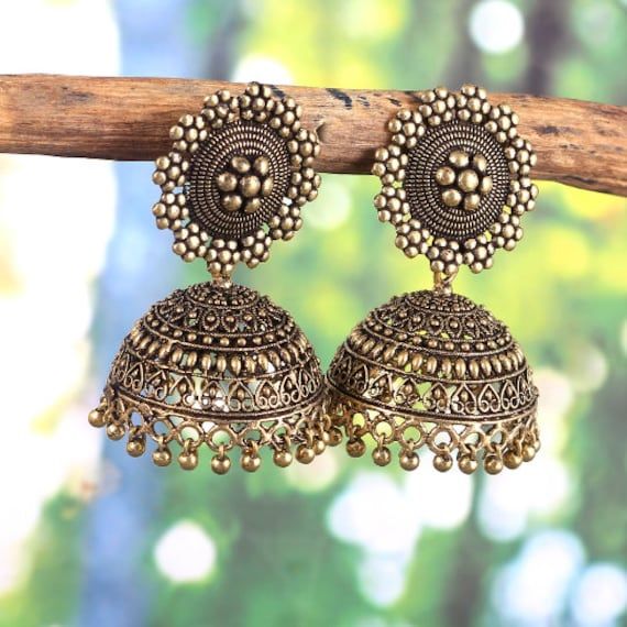 These stylish Earrings from HaniyaIndia will certainly leave you spellbound. These Earrings have an excellent finish and gives out an exquisite sense of style. If you are looking for an amazing Fashion Jewelry set for special occasions such as Anniversary, Engagement, Party, Wedding or for gifting , then your search ends here. DESCRIPTION Oxidized Gold Earrings Sales Package: 1 Pair Earrings COLOR: Same as shown in picture OCCASION: PARTY WEAR , WEDDING, MARRIAGES, CASUAL, DAILY WEAR BEST GIFT FOR HER Seller Info: We are Aiming to supply best products to customers at best price. We believe good product nothing without good customer service. We always there for any query or help understanding something. Payment: We accept Payment Only Via PayPal ,Its safest way both of us. Shipping Policy: Oxidized Jhumkas, Indian Jhumka, Ankle Jewelry, Jhumki Earrings, Indian Jewellery Design, Fancy Earrings, Engagement Party Wedding, Fashion Jewelry Sets, Fancy Jewellery