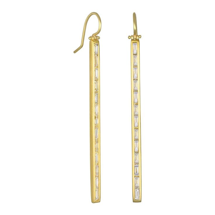 Channel set in 18 karat gold, the diamond baguettes create a sleek, clean line for a chic, contemporary look. Matte-finished with hinged ear wires for movement. Diamonds: E/F, VS Quality 2.68 TCW Length: 2.17 " x .12" Made in the USA Line Earrings, Channel Set, Modern Earrings, Baguette Diamond, Look Chic, Modern Jewelry, Ear Wires, Clean Lines, Green And Gold