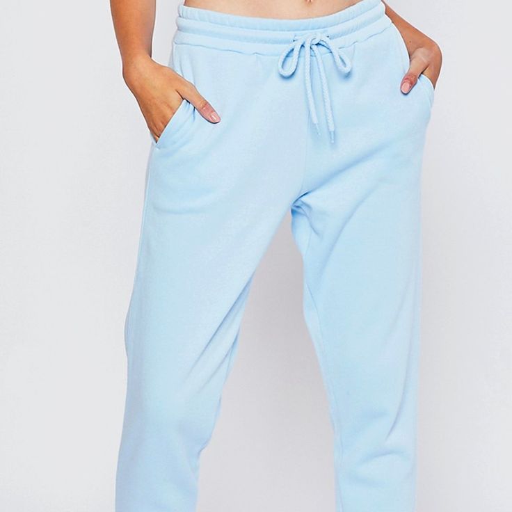 Warm And Cozy Blue Fleece Lined Sweatpants With Adjustable Waistband. -50% Cotton, 50% Polyester -Warm Fleece Lining -Elastic Waistband With Adjustable Drawstring -Side Front Pockets *Model Is Wearing A Size Small Blue Pants With Pockets For Leisure, Blue Joggers For Spring Loungewear, Spring Blue Joggers For Loungewear, Light Blue Relaxed Fit Sweatpants For Loungewear, Blue Athleisure Joggers For Lounging, Blue Stretch Pants For Leisure, Spring Blue Joggers With Elastic Waistband, Blue Joggers With Pockets For Leisure, Blue Leisure Joggers With Elastic Waistband