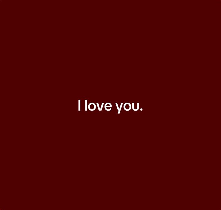 the words i love you written in white on a red background