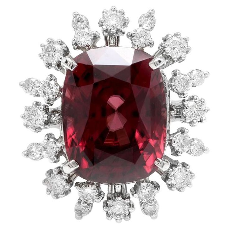 13.90 Carats Natural Red Zircon and Diamond 14K Solid White Gold Ring Suggested Replacement Value: Approx. $9,500.00 Total Natural Oval Cut Zircon Weight is: Approx. 13.00 Carats Zircon Measures: Approx. 13.00 x 10.00mm Natural Round Diamonds Weight: Approx. 0.90 Carats (color G-H / Clarity SI1-SI2) Ring size: 7 (free re-sizing available) Ring total weight: Approx. 7.8 grams Disclaimer: all weights, measurements and colors are approximate and may vary slightly from the listed dimensions or as se Zircon Jewelry, Jewelry Outfit, White Gold Ring, Natural Red, White Gold Rings, Cocktail Rings, Oval Cut, Gold Ring, Round Diamonds