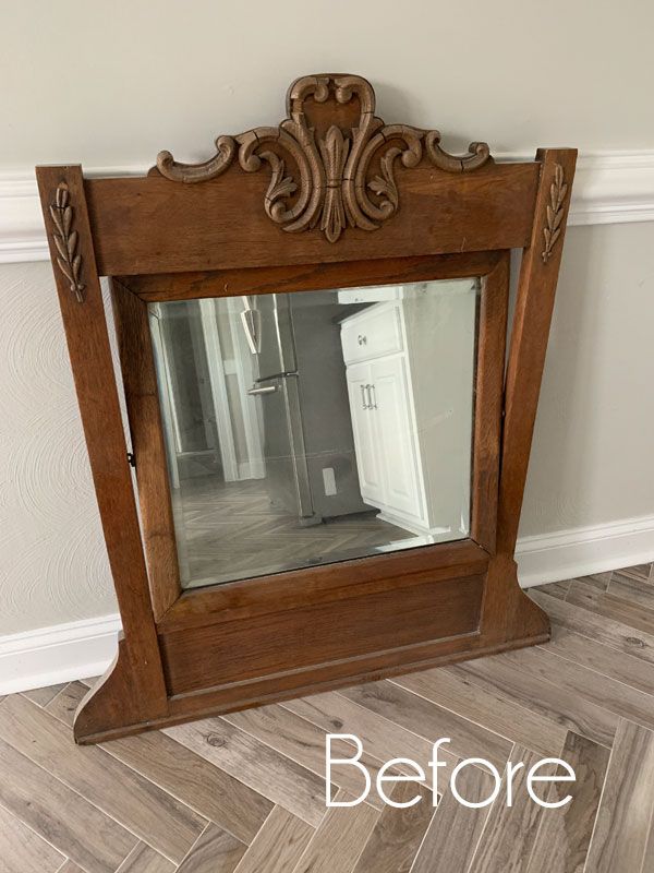 a mirror that is sitting on the floor in front of a wall with words before and after