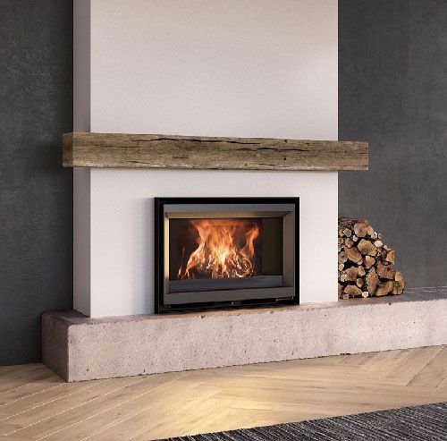 a wood burning fireplace in a living room