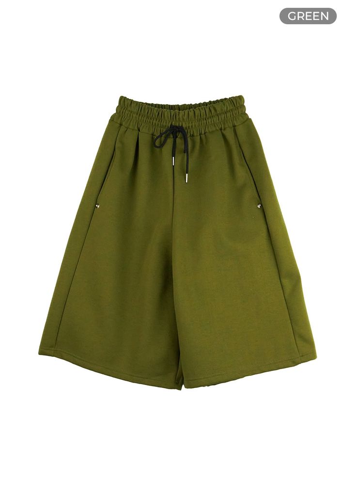 Green / M/L Green Cotton Shorts For School, Green Cotton School Shorts, Green Stretch Shorts With Drawstring, Green Short Bottoms For School, Green Short Length Bottoms For School, Green Knee-length Bottoms With Side Pockets, Casual Green Shorts For School, Casual Green School Shorts, Sporty Green Bottoms For School