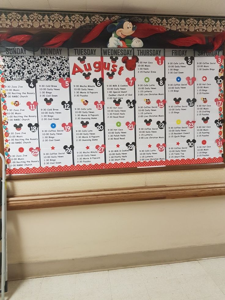 a bulletin board with mickey mouses on it