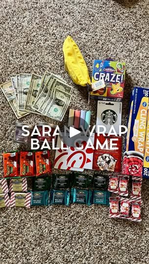 the contents of a bag are laid out on the floor next to cash and candy