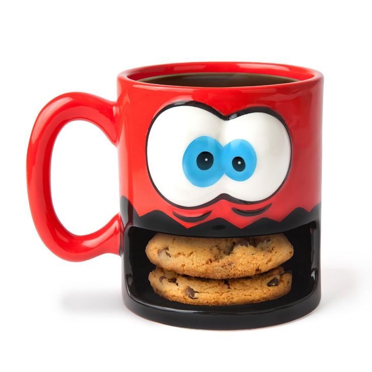 a cookie monster mug with cookies in it