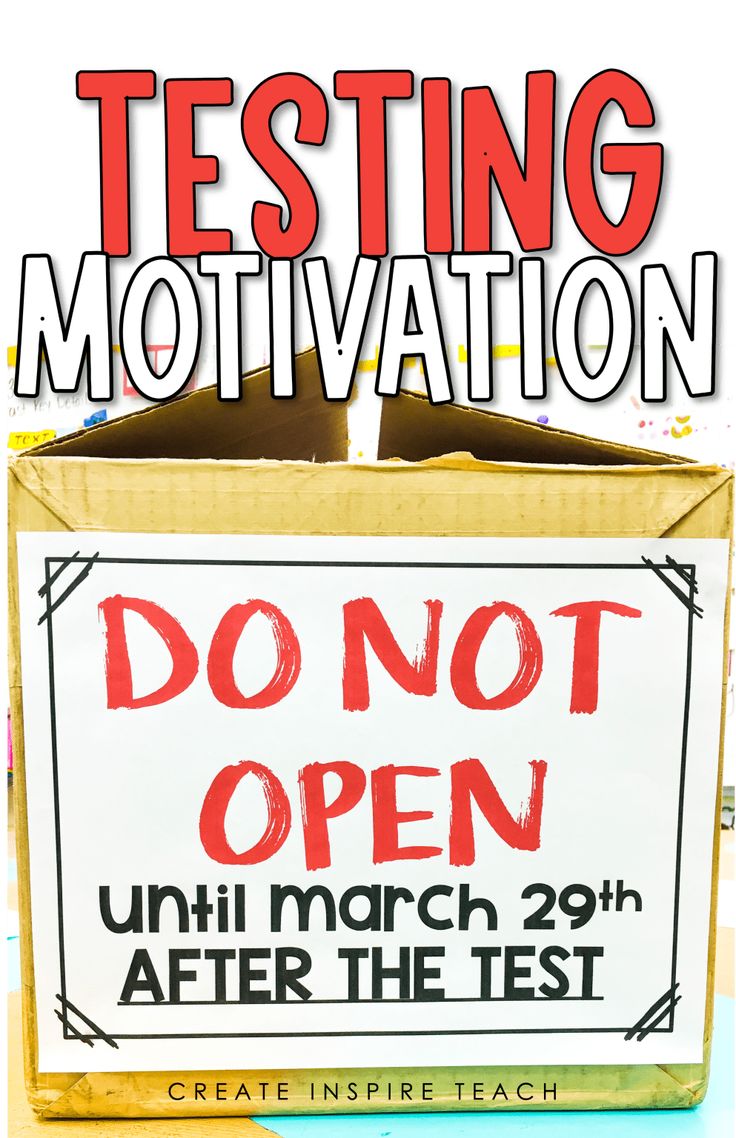 an open box with the words testing motivation written in red and black on it, next to a sign that reads don't open until march 29 after the test