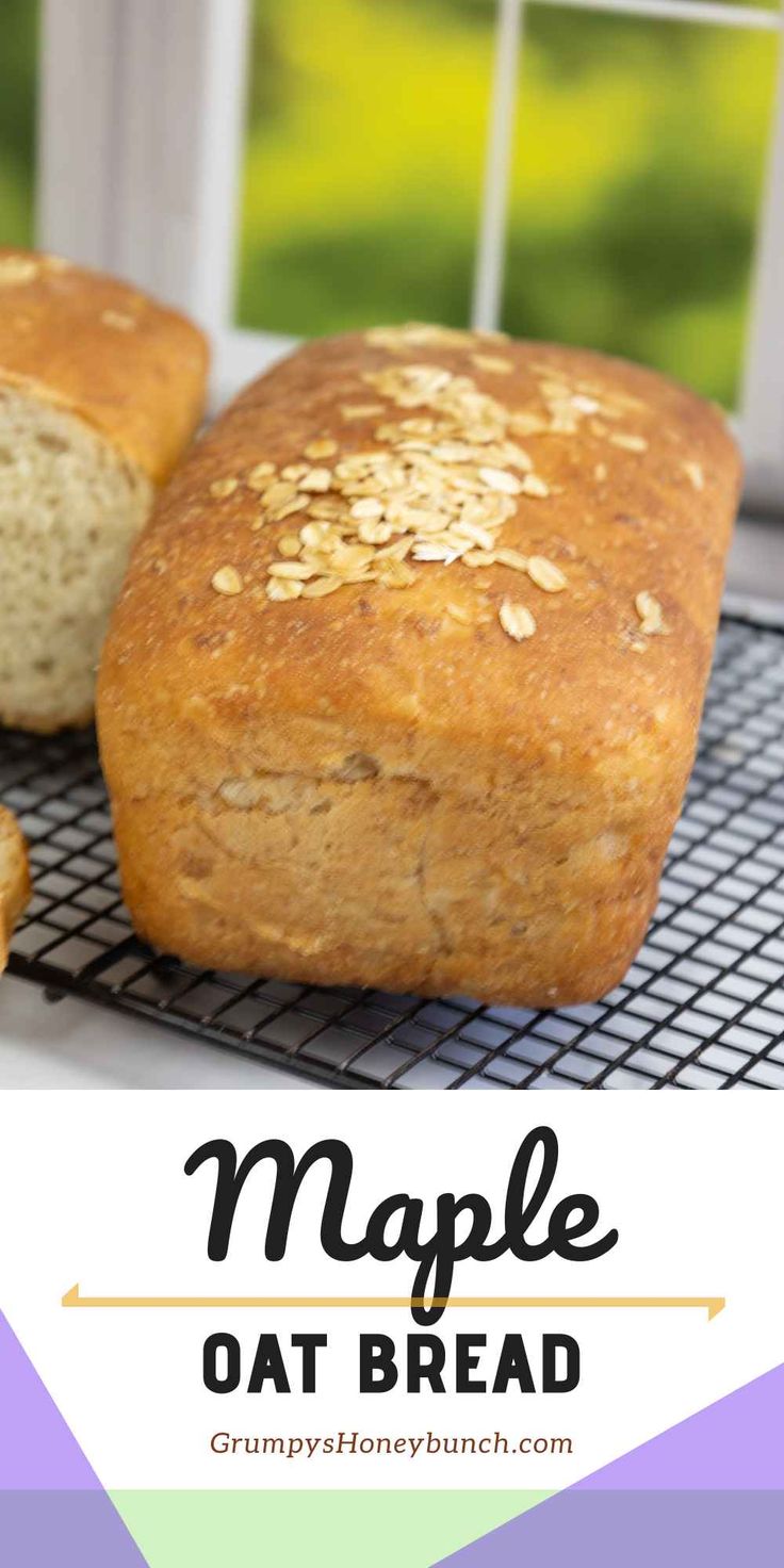 two loaves of oat bread on a cooling rack with the words maple oat bread