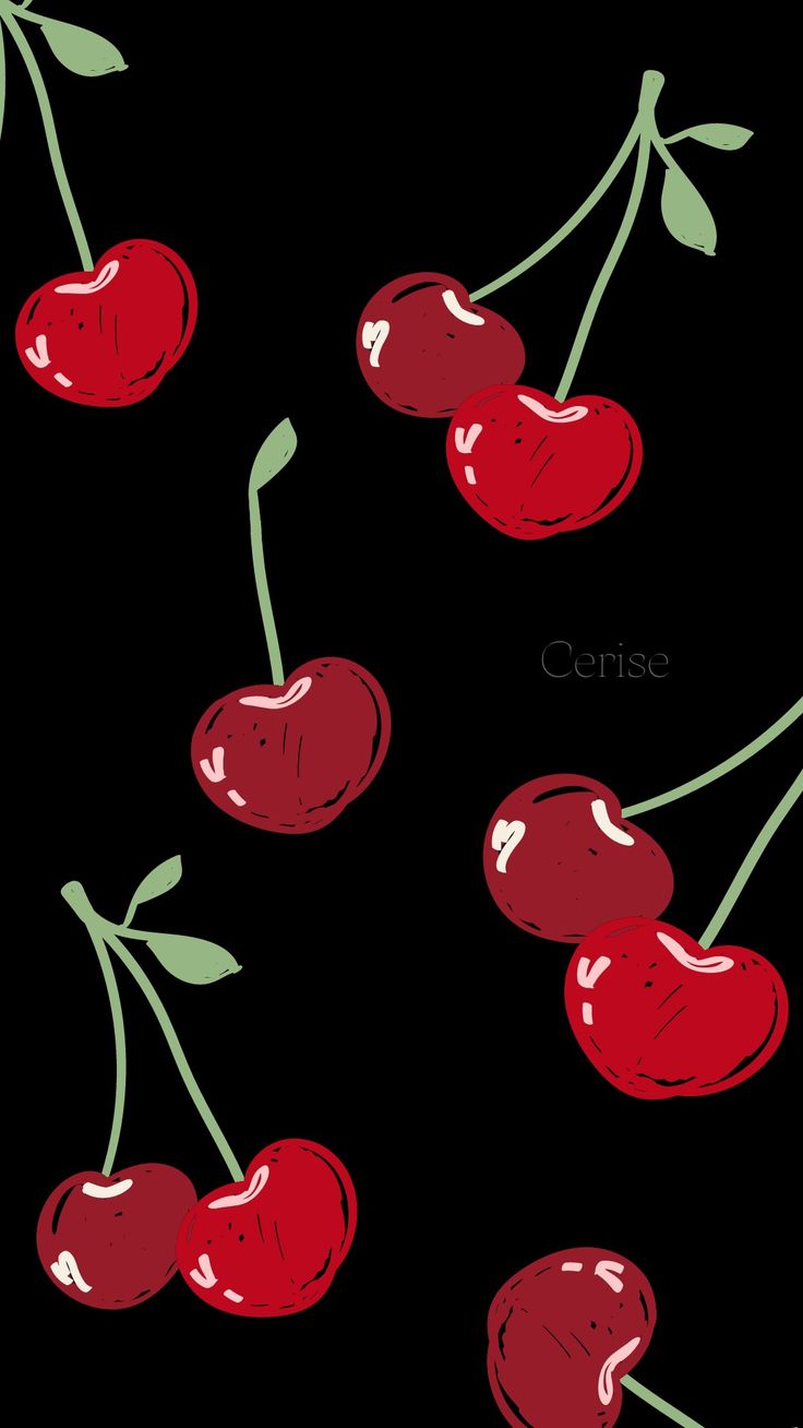 three cherries on a black background with green stems