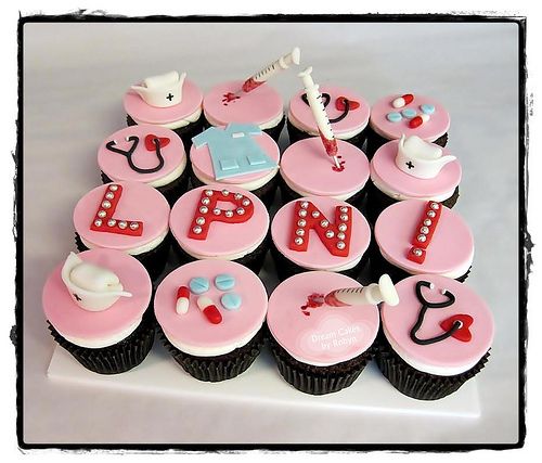 cupcakes are arranged in the shape of letters and nurse's tools on top