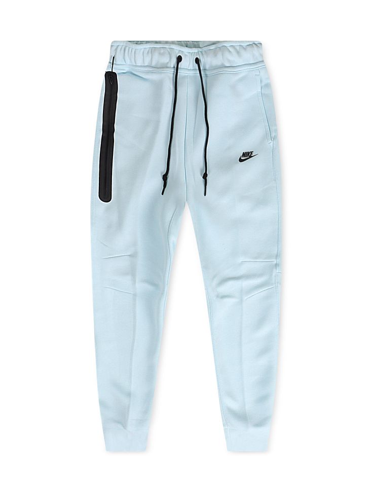 Upgrade your casual look with Nike Sportswear Tech Fleece Joggers. These joggers feature a slim, tailored fit with smooth, warm fleece and ribbed cuffs. The iconic paneled design, articulated knees, and taped pocket with an organizer offer both style and functionality. Made from a cotton-poly blend for comfort, they pair perfectly with the Tech Fleece hoodie. Light Blue Nike Joggers, Blue Tech Fleece, Jean Hat, All Jordans, Nike Sportswear Tech Fleece, Tech Fleece Hoodie, Nike Tech Fleece, Blue Back, Fit Ideas