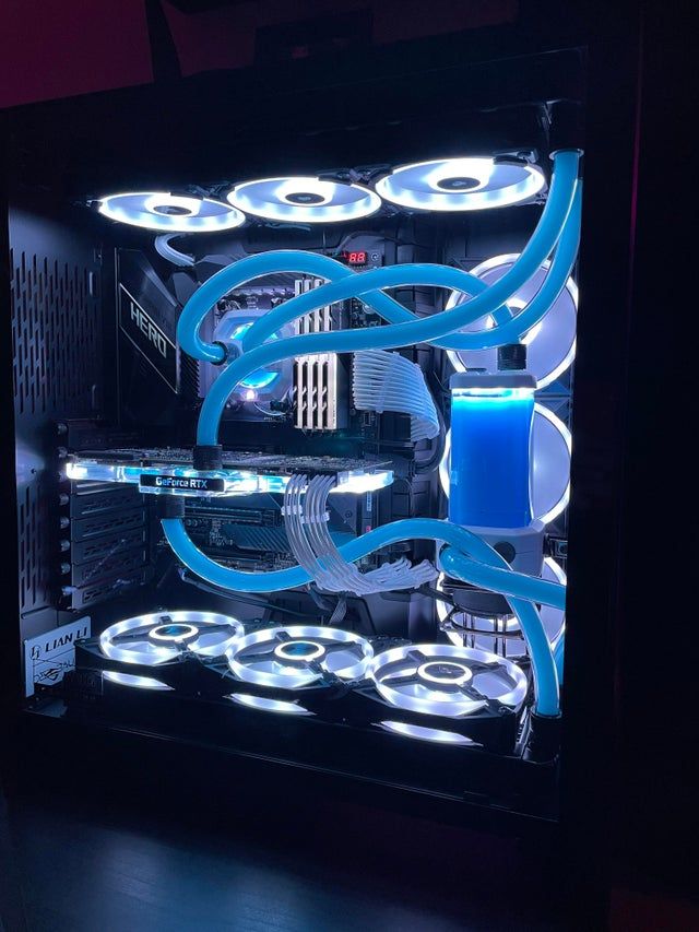 the inside of a computer case with blue lights