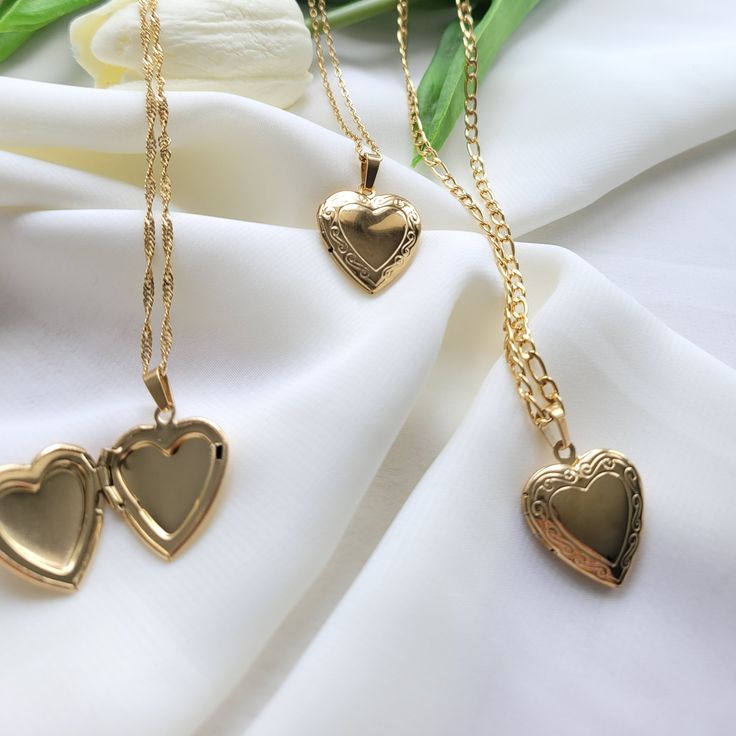 All our items are 18K gold filled over stainless steel material.They are impervious to water and they will not change their color.While wearing this jewelry, they will not cause any allergic reactions to skin. We know how time is important to you, therefore we offer 1 day processing for your orders and 3-6 days for shipping them. Please let us know if you need any further information via DM or if you need any customization on your orders.. We are proud to serve you and 100% sure that you will be Gold Heart Locket Necklace, Small Diamond Necklace, Engraved Locket, Gold Heart Locket, Gold Locket Necklace, Cute Gifts For Friends, Personalised Gifts For Friends, Necklace Big, Heart Locket Necklace