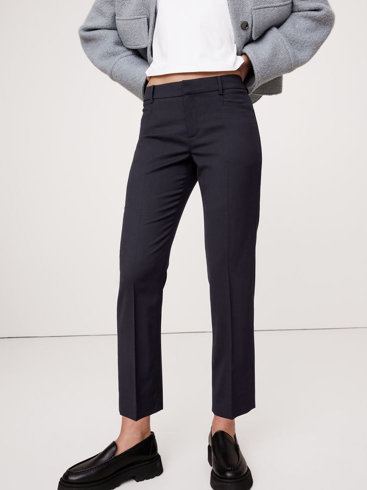 A tailored piece of performance, this soft and luxurious pant is crafted from responsible Italian wool that moves with ease.  A sleek and modern fit for the office or date night.  Stretch, Breathable, Wrinkle-Resistant.  Mid-rise.  Slim leg.  Ankle length.  Fabric from Italy's Marzotto Mill.  Zip fly with button closure.  Four-pocket styling.  Flat front.  Trouser crease.  Unlined.  *This style runs large.  Consider sizing down.  Slim-Straight Fit: Mid-rise (8").  Straight throughthe hip and thi Petite Shorts, Slim Leg, Ankle Pants, Slim Legs, Petite Size, Siena, Modern Fit, Ankle Length, Date Night