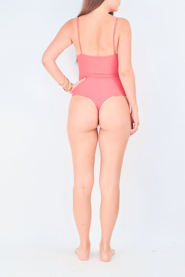 This bodysuit is absolutely everything! To be honest it's probably the only thing you need in your closet. Dine in it, dance in it, swim in it, just live in it. These ultra soft seamless bodysuits feel like you're literally wearing nothing. They're so comfortable you'll probably end up sleeping in it. 80% Nylon 20% Spandex Garment fits true to size Hand or gentle wash and lay flat to dry Seamless double layered fabric can be worn as intimates or swim Model is wearing size Small and is 5'10 High Cut Summer Leotard With Built-in Bra, High Cut Bodysuit With Built-in Bra For Summer, Summer High Cut Lined Leotard, High Cut Summer Leotard With Lined Body, High Cut Shapewear Swimwear For Summer, High Cut Shapewear Swimwear For Swimming, Summer High-cut Lined Leotard, Shapewear High-cut Swimwear, Seamless One-piece Bodysuit For Pool