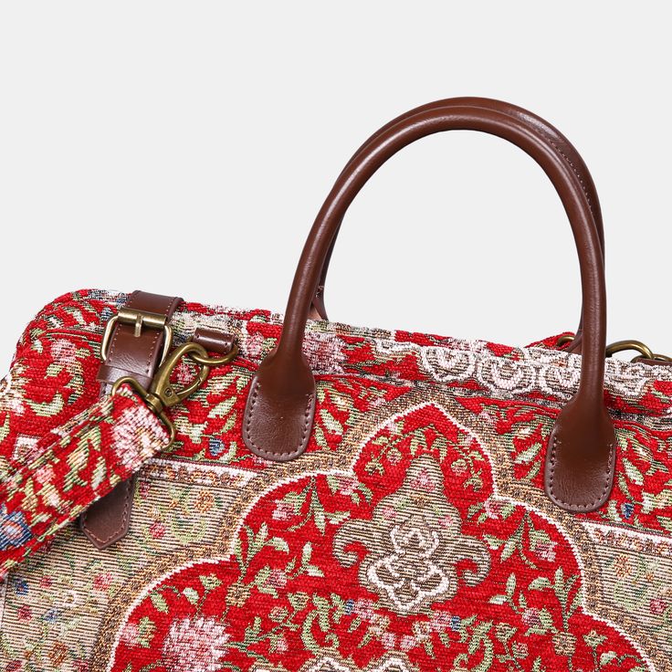 With a nod to the Victorian era, MCW’s freshly combines the classic and elegant design of the traditional carpet bag with a textural and tactile twist.The main body of spacious travel bags are made with thick chenille carpets. The handles and belts are genuine leather with heavy cotton canvas lining. Six bronze stands at the bottom allow the bag to stand stably. Every bag comes with a detachable and adjustable shoulder strap (55 inches) made from the same chenille as the bag with leather anti-lo Red Travel Briefcase With Top Carry Handle, Luxury Red Bags With Adjustable Handle, Traditional Red Satchel For Travel, Tapestry Satchel Shoulder Bag For Travel, Tapestry Tote Shoulder Bag For Travel, Travel Tapestry Satchel Shoulder Bag, Red Travel Satchel With Detachable Handle, Rectangular Tapestry Shoulder Bag For Travel, Tapestry Travel Satchel Shoulder Bag