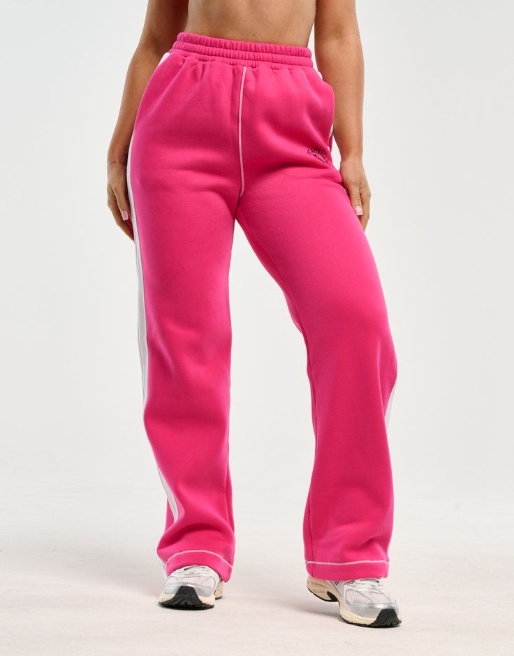 Loved by all for their cosiness and dependability. The Blur Flare Sweatpants are the perfect basics to help you get more out of your athleisure - Regular Waisted. Mid-rise waistband - Fabric is cotton mix for warmth and softness - Waist pockets - Embroidered ECHT Logo - Designed for low movement activities 60% Cotton, 40% Polyester Skye is wearing size Small. She is 170cm (5'6") tall with an 33" bust, a 25" waist and 36" hips. Sporty Pink Straight Leg Pants, Trendy Pink Sweatpants For Sports, Trendy Sports Sweatpants With Elastic Waistband, Sporty Sweats With Elastic Waistband And Loosely Fitted Hips, Athleisure Straight Joggers With Ribbed Waistband, Trendy Relaxed Fit Gym Bottoms, Pink Wide Leg Sweatpants Athleisure Style, Pink Wide Leg Athleisure Sweatpants, Relaxed Fit Full Length Sweatpants With Elastic Side Panels