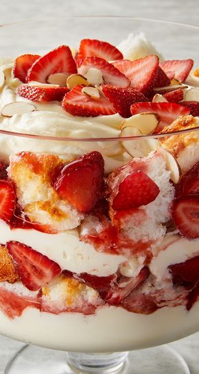 a trifle with strawberries and almonds on top