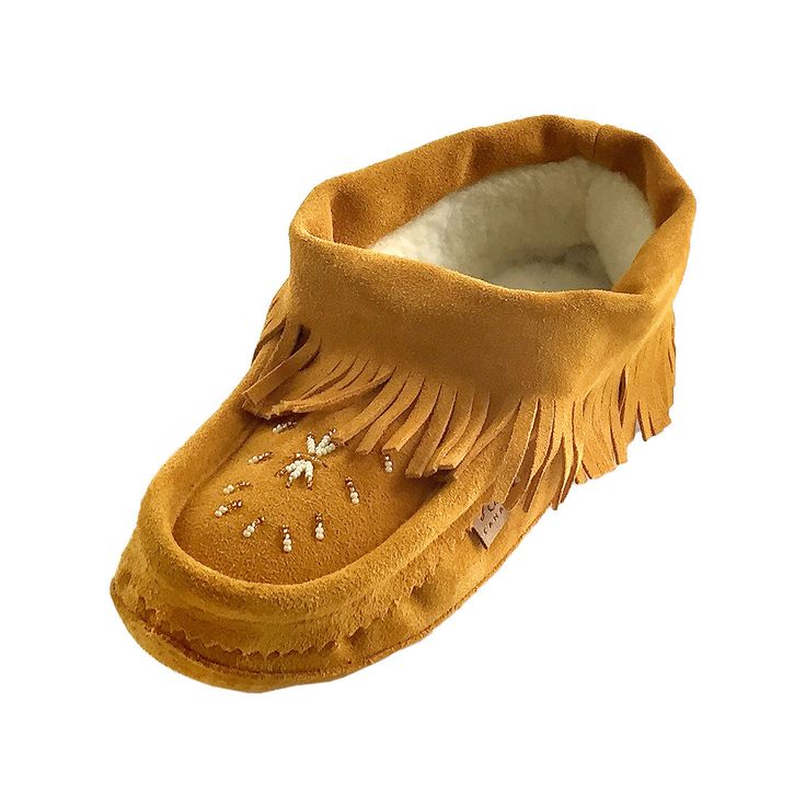 Description Details Sizing These ladies moccasin slippers are extremely attractive and will keep your feet warm and comfortable. There are several stylish features that make these women's soft sole moccasins so fashionable. They have a beautiful hand-beaded design on the vamp and a loose fold over fringe around the entire footbed. They are slightly taller than regular moccasin slippers and reach approximately 3.5" tall (ankle height).The women's indoor moccasin slippers are Canadian handmade fro Mocassin Pattern, Native Moccasins, Moccasin Patterns, Moccasin Pattern, Fringe Moccasins, Beaded Patterns, Soft Sole Slippers, Native Beading, Beaded Moccasins