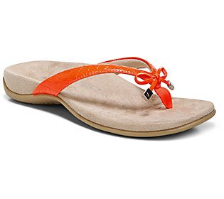 How do you take your sandals? If you answered, extra comfy with a side of sweetness, the Bella is here for it. Wear the slip-on-and-go pair wherever the waves lap the sand, the sunsets make you stop and stare, or the summer days just never seem to end. From Vionic®. Adjustable Slip-on Flip Flops For Swimming, Adjustable Non-slip Flip Flops For The Beach, Comfortable Yellow Slip-on Flip Flops, Casual Red Non-slip Flip Flops, Red Non-slip Synthetic Flip Flops, Thong Sandals, The Sand, Summer Days, Slip On