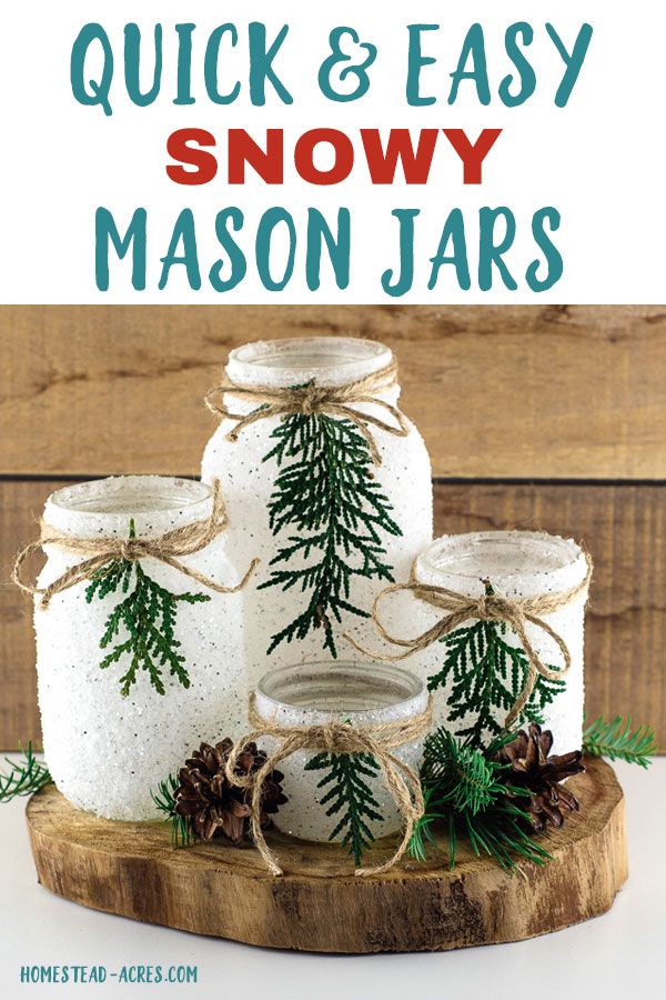 mason jars are decorated with pine cones and evergreen branches for quick and easy snowy mason jars