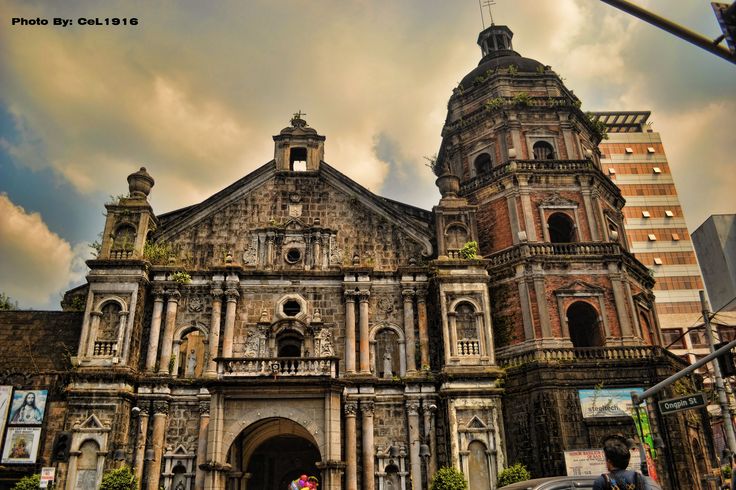 an old church in the middle of a city