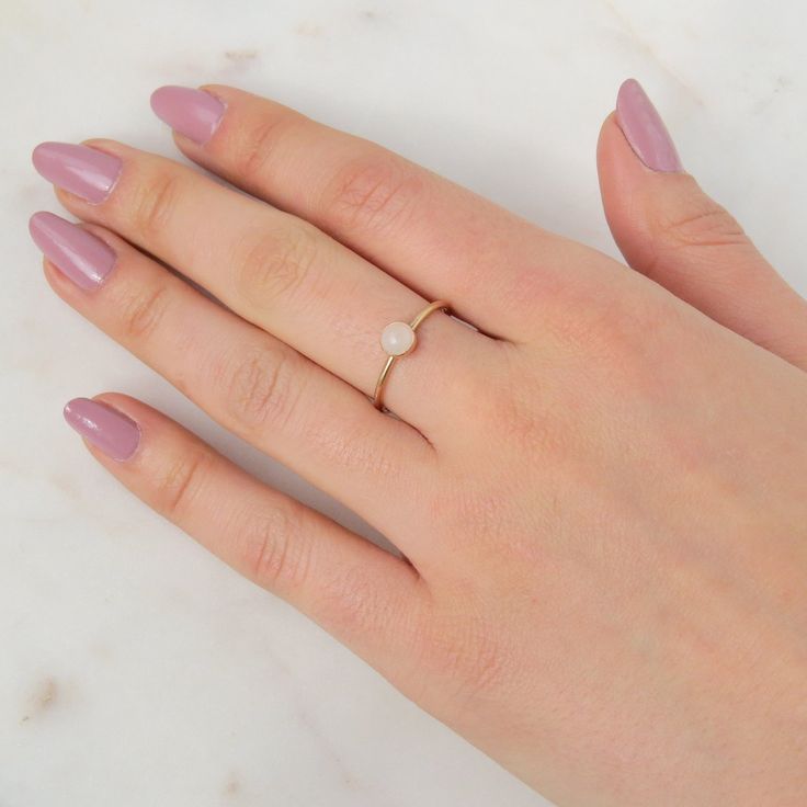 Our delicate Rose Quartz Ring features a pink natural gemstone in a gold filler or sterling silver setting! Rose Quartz is the birthstone for all our October-born babes. Don't know your ring size? Ring Size Guide or Buy Ring Sizer …………………………………. Details: Stone is Natural Rose Quartz, measuring 5mm Available in 14k Gold Filled or Sterling Silver Waterproof and can be worn everyday Size Inclusive and made to order About Your Jewelry If you are not wearing your jewelry it is best to store it in a c October Born, Buy Rings, Gold Gemstone Ring, Rose Quartz Ring, Rose Quartz Gemstone, Argentium Silver, Ring Sizer, Quartz Rose, Quartz Ring