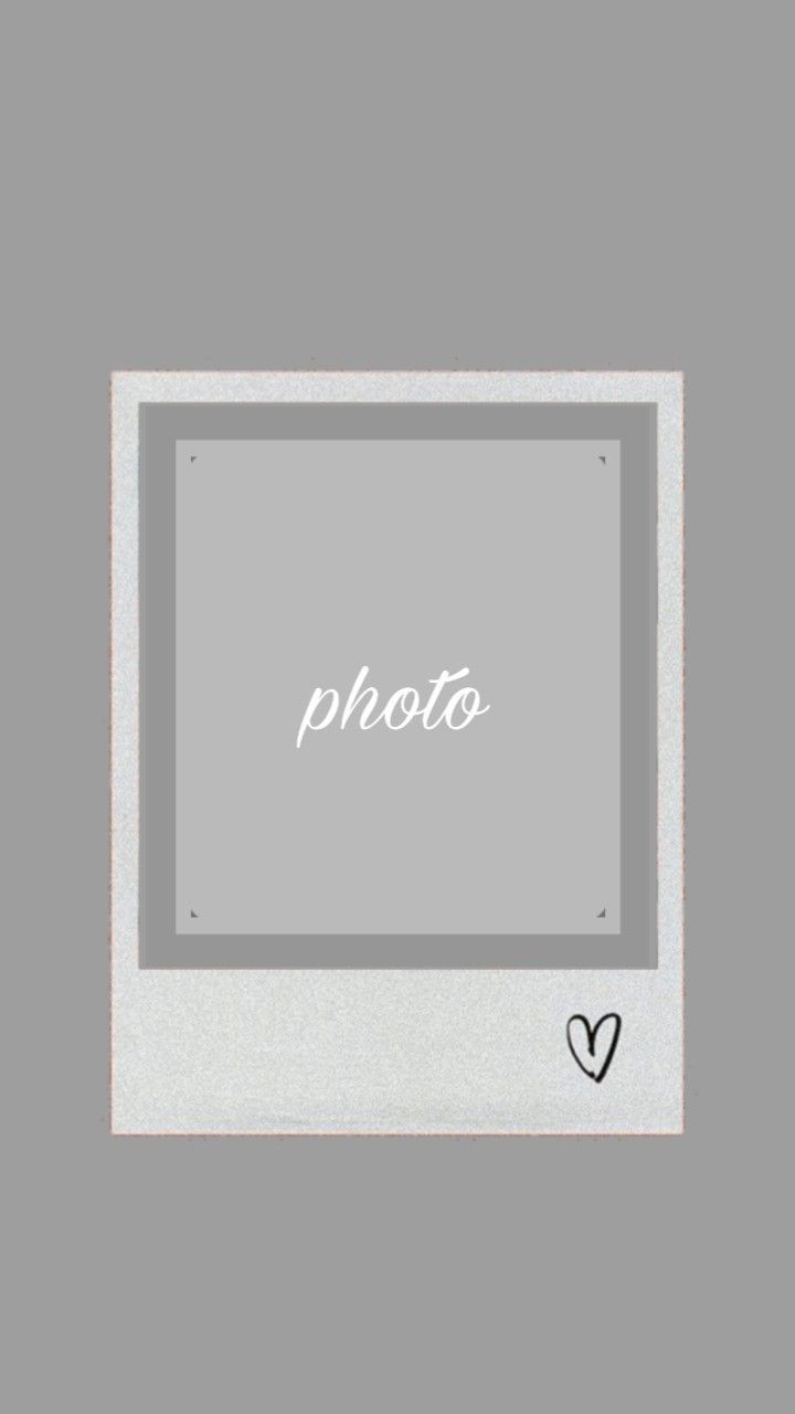 an old photo frame with the word photo in white and black on it, against a gray background